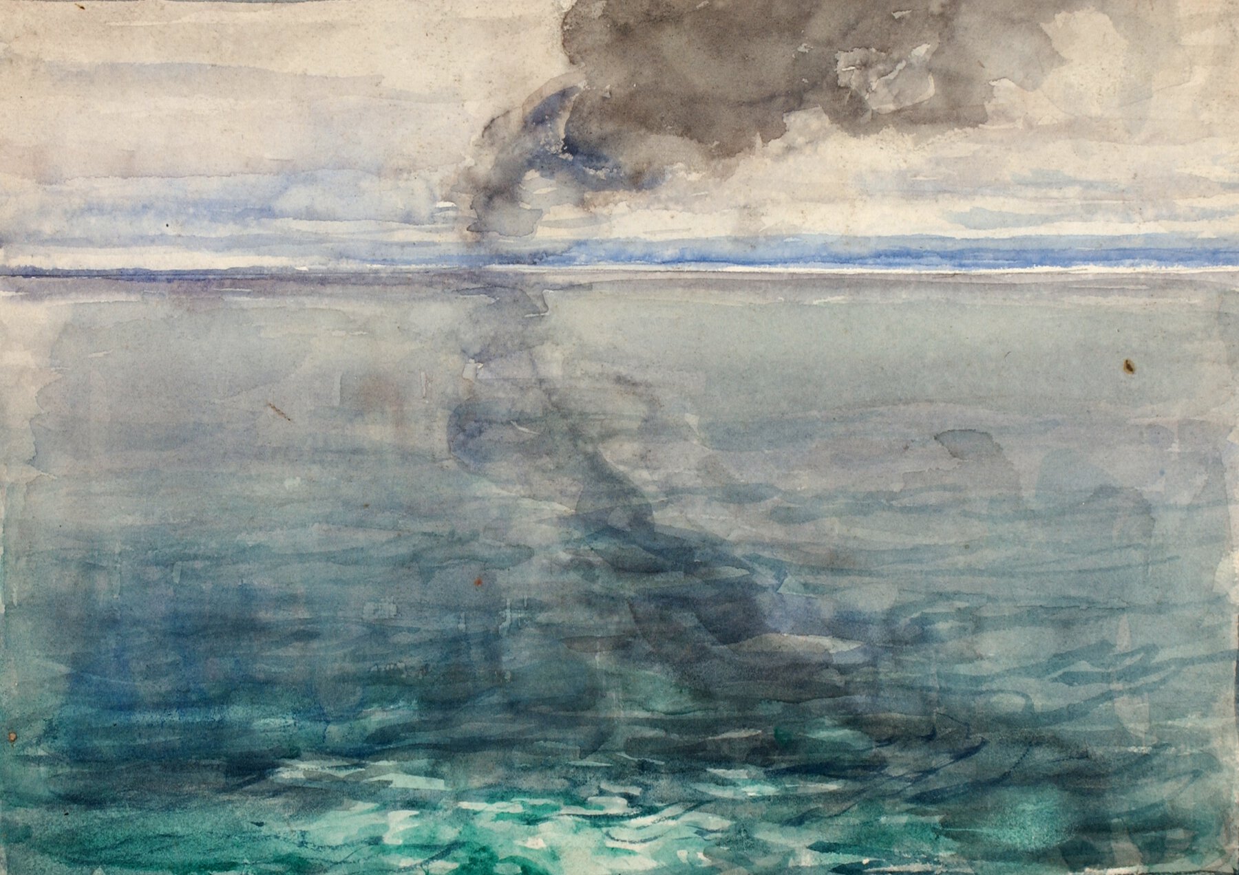 Scene of ocean water with clouds and plume of dark smoke rising in background.